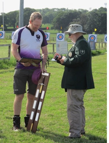 Roger Smart presented with the Yorkshire Sword by Andy Wilkinson